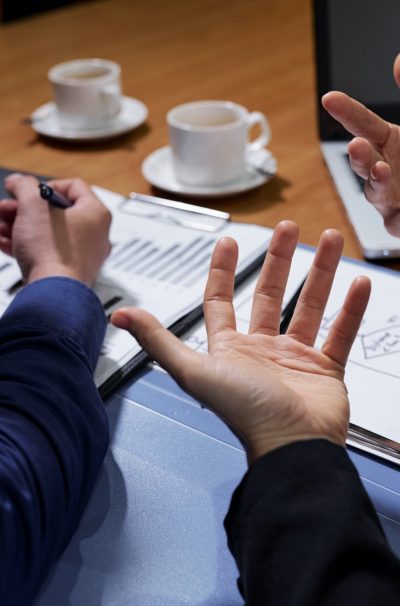 Business people discussing research